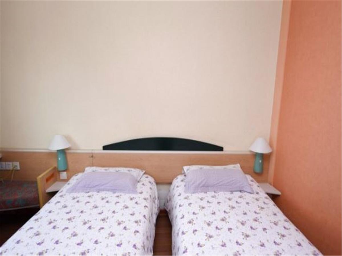 Motel Qingdao Jiaonan Renmin Road Business Street المظهر الخارجي الصورة